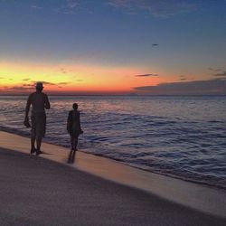 Scenic view of sea at sunset