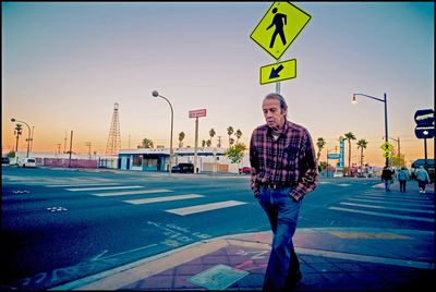 Man standing on road