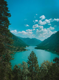 Scenic view of lake against blue sky