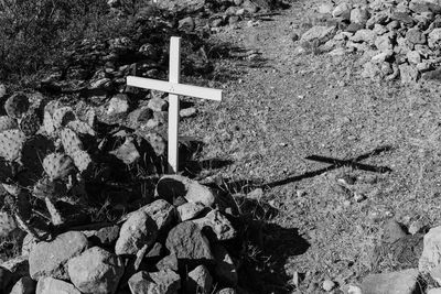 High angle view of cross on field