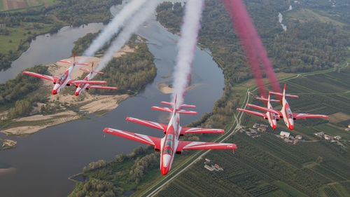 Aerial view of airplane flying in park