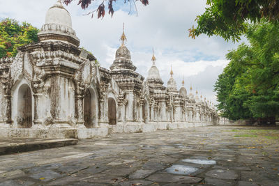 View of temple against cloudy sky