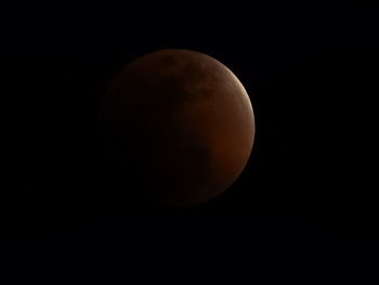 Close-up of moon against clear sky at night