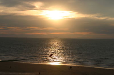 Scenic view of calm sea at sunset