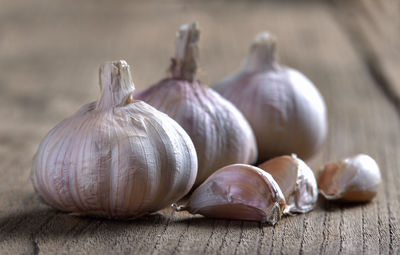 Close-up of garlic on table