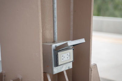 Close-up of clock on wall