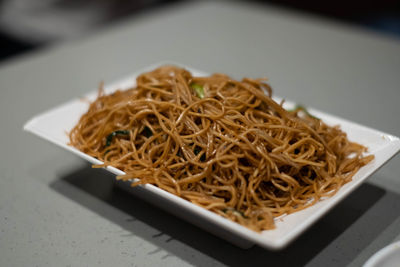 High angle view of noodles in plate on table