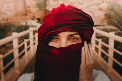 Close-up of woman wearing hat