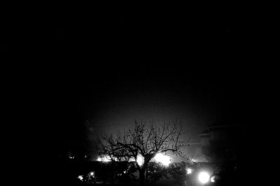 Scenic view of landscape against sky at night