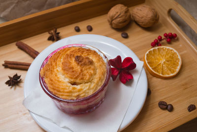 Christmas dessert serving of plum baked pie in ramekin