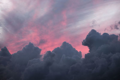 Low angle view of dramatic sky during sunset