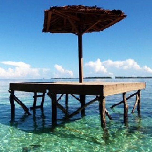 water, sea, sky, pier, horizon over water, wood - material, blue, waterfront, built structure, tranquility, wood, tranquil scene, nature, rippled, scenics, cloud, jetty, wooden post, beauty in nature, day