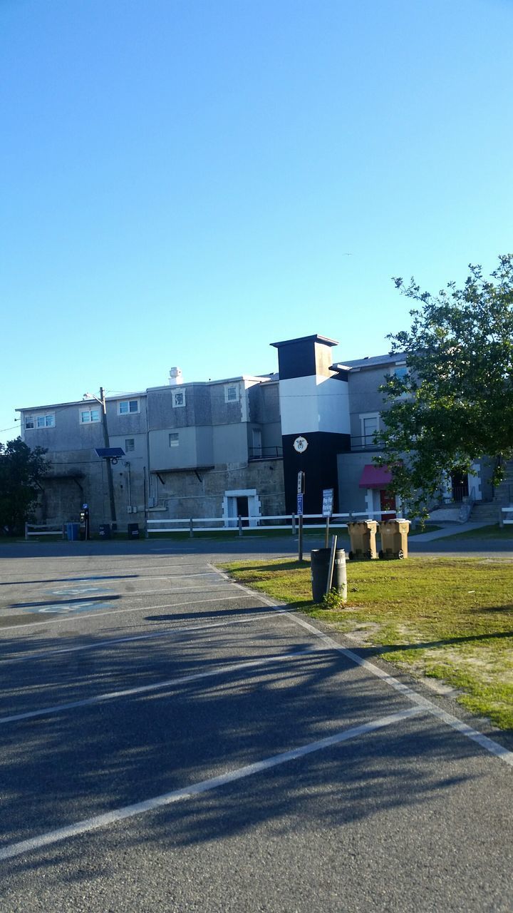 VIEW OF BUILDINGS AGAINST BLUE SKY