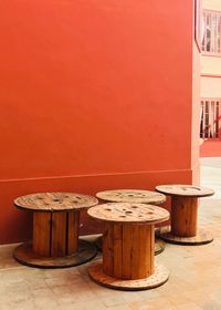 Wooden table against wall