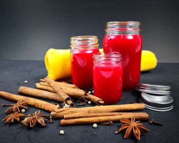 Close-up of beer in glass jar on table