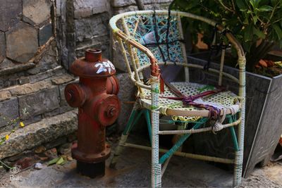 Close of view of fire hydrant next to chair