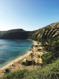 Scenic view of beach against clear sky