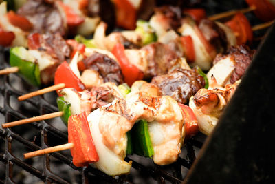 Close-up of meat on barbecue grill