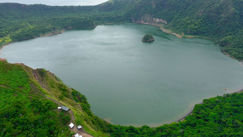 The smallest volcano in the philippines is taal with a green crater lake, aerial view. tagaytay