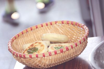 Close-up of bread in basket on table