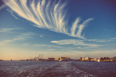 Scenic view of sea against blue sky