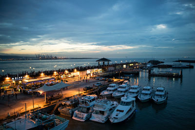 High angle view of boats moored at harbor