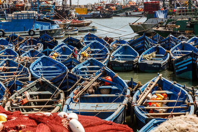 Boats moored at harbor