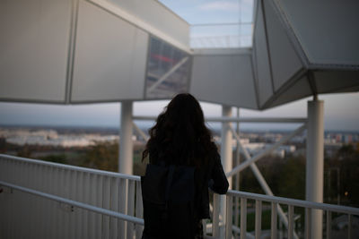 Rear view of woman standing at observation point