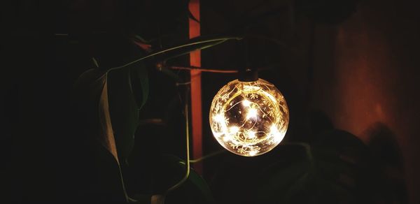 Close-up of illuminated light bulb