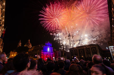 Firework display at night