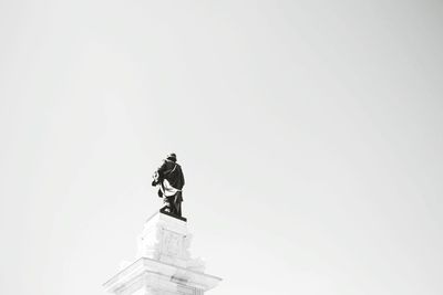 Low angle view of statue against clear sky