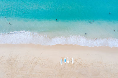 Surin beach and tourists travel location summer holiday in thailand aerial top view
