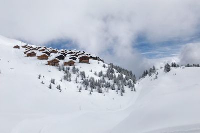 Scenic view of snow covered mountain against sky