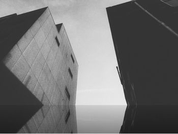 Low angle view of skyscraper against clear sky