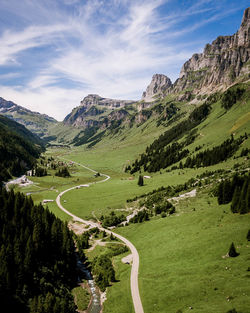 Scenic view of mountain against cloudy sky