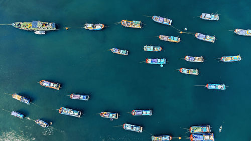 High angle view of boats moored in sea