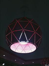 Low angle view of illuminated lights hanging from ceiling