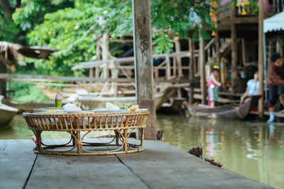 Table on deck by lake