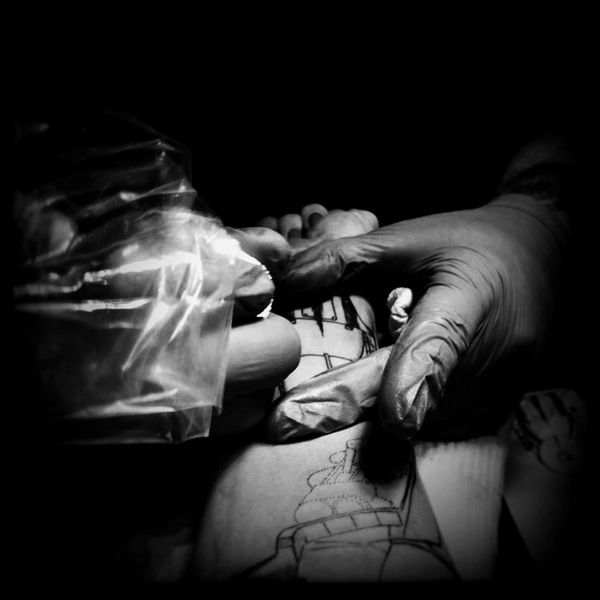 person, indoors, human finger, holding, part of, unrecognizable person, close-up, cropped, black background, studio shot, high angle view, auto post production filter, lifestyles, copy space, personal perspective, selective focus, men