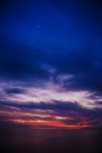 Low angle view of dramatic sky at sunset