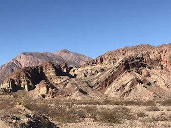 Scenic view of mountains against clear sky