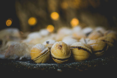 Moody picture of traditional christmas bakeries on a place with bokeh effect and cozy atmosphere.