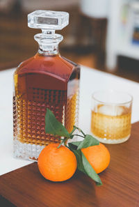 Close-up of orange juice in glass on table