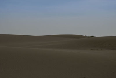 Scenic view of desert against sky