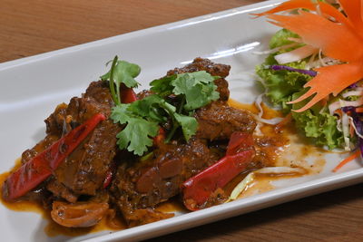 High angle view of food in plate on table