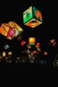 Illuminated lanterns hanging at night