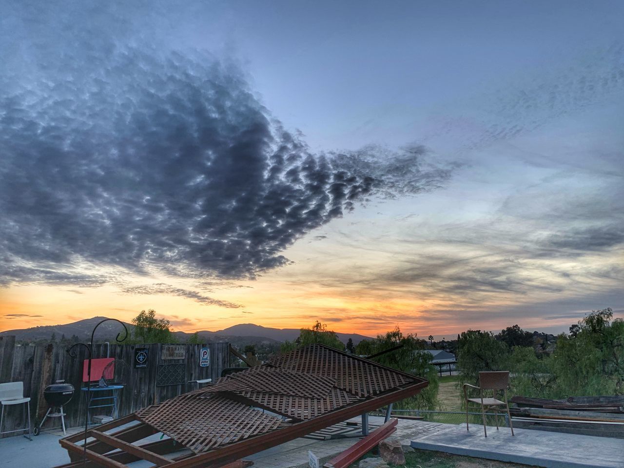 BUILDINGS AGAINST SKY AT SUNSET