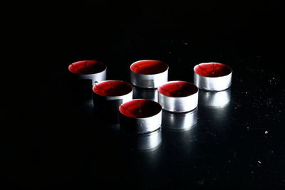 Close-up of red object over black background