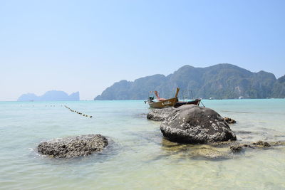 Scenic view of sea against clear sky