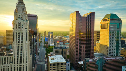 Modern buildings in city against sky